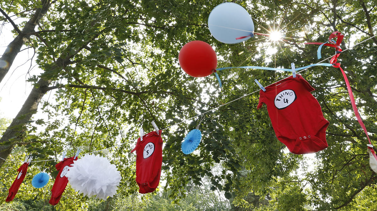 First Place, Feature Picture Story - Chris Russell / The Columbus Dispatch A Dr. Suess themed baby shower  celebrating the soon to be born quads was held for Annie and Joby Johnston in Joby's home town of Troy, Ohio.  