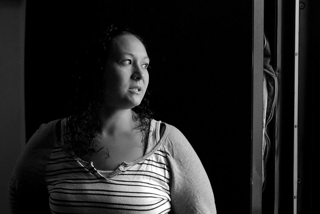 Award of Excellence, Feature Picture Story - Kristin Bauer / The (Elyria) Chronicle-TelegramTabitha Crabtree, a single mother of three, has lived in an apartment complex run by the Lorain Metropolitan Housing Complex for 11 years.  Tabitha first moved to Wilkes Villa when she was pregnant with her first child, and never thought she would stay.  Although Wilkes Villa was the best place for her at the time, throughout the years, while not making nearly enough to support a family of four, Tabitha found herself stuck in what many call the "projects."  With an autistic son, mounting doctors' bills, and the cost of living, Tabitha said, "I was working so we could be OK today." A month before the move, Tabitha looked at trailer homes at Colonial Oaks Mobile Home Park, in Elyria, Oh.  That same day, she put a deposit down on a home; a decision which was largely influenced by her desire to stand on her own two feet and her three children--Scott, 10, Dillon, 6, and Aurora, 3. Then, on a rainy Saturday morning in July, with the help of her children and friends, Tabitha packed a truck with her family's belongings for the move.  Although her new home is just 5 minutes down the road, she and her family left public housing to go home.  Tabitha said, "I got my family out, and I am never coming back." ____Tabitha Crabtree, a single mother of three, has lived in an apartment complex run by the Lorain Metropolitan Housing Complex for eleven years.  Tabitha first moved to Wilkes Villa when she was pregnant with her first child, and never thought she would stay.  Although Wilkes Villa was the best place for her at the time, throughout the years, while not making nearly enough to support a family of four, Tabitha found herself stuck in what many call the "projects."  With an autistic son, mounting doctors' bills, and the cost of living, Tabitha said, "I was working so we could be OK today."