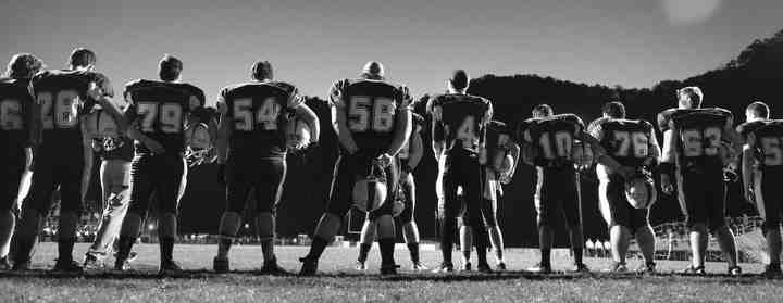 First Place, Larry Fullerton Photojournalism Scholarship - Jenna Watson / Kent State UniversityThe Leslie County Eagles pause for the invocation prayer at the end zone before taking on Betsy Layne. The team prays before and after each game, displaying a very strong connection to faith in the community. 