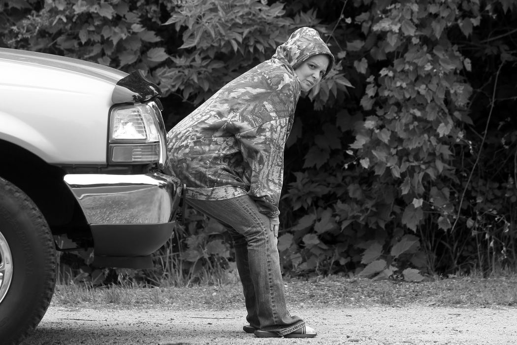 First Place, News Picture Story - Amy E. Voigt / The (Toledo) BladeAngela Steinfurth, mother of missing toddler, waits while members of The Toledo Police Dept. near the Maumee River where authorities are searching for Elaina Steinfurth, 1, who went missing on Sunday.