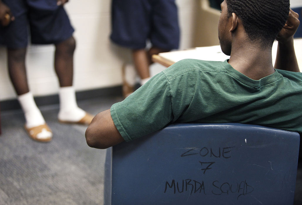 Second Place, James R. Gordon Ohio Undertanding Award - Eamon Queeney / The Columbus DispatchTeenagers talk during a session called Managing Anger and Violence in a close – or maximum – security unit at the Circleville Youth Detention Center outside of Columbus, Thursday afternoon, July 18, 2013. Many of the teenagers at the detention center are repeat offenders in for violent crimes some of whom have shot other gang members or have been shot themselves. 