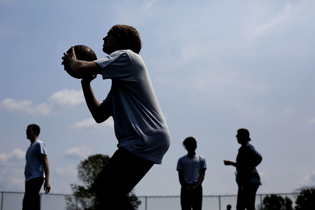 Second Place, James R. Gordon Ohio Undertanding Award - Eamon Queeney  / The Columbus DispatchTeenagers play basketball at the Central Ohio Youth Center in Marysville Tuesday afternoon, August 20, 2013. The COYC is a trauma-based facility for juvenile offenders which focuses on treatment more than incarceration, although it is still maximum security. 