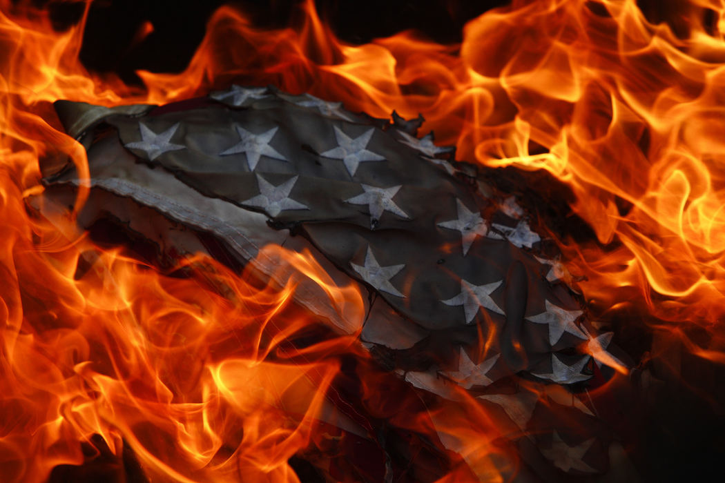 First Place, Pictorial - Joshua A. Bickel / ThisWeek Community NewsFlames engulf an American flag during Boy Scout Troop 826's flag retirement ceremony at VFW Post 9473 in Reynoldsburg.