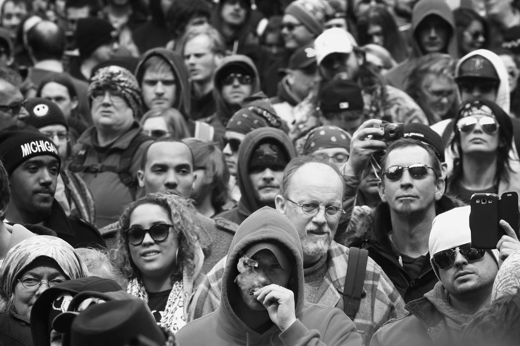 First Place, Photographer of the Year - Large Market - Katie Rausch / The (Toledo) BladeMarijuana supporters gather at this year's, "Hash Bash," in Ann Arbor, Mich. Many openly smoked marijuana at the gathering, which included speeches from many local and regional marijuana rights activists.  