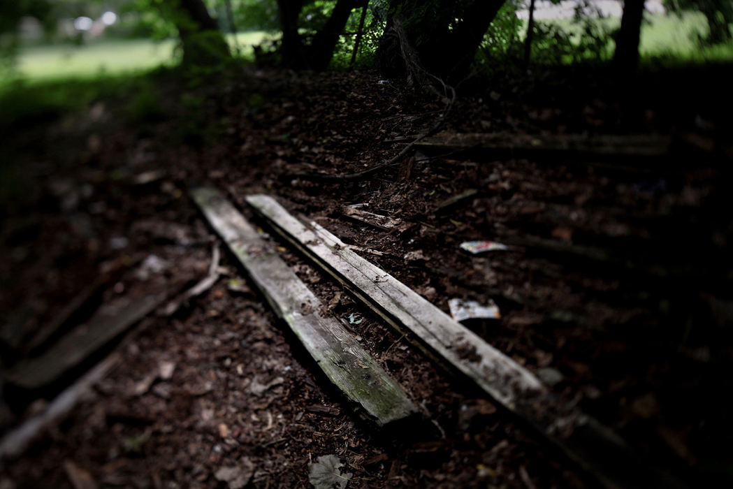 Second Place, Photographer of the Year - Large Market - Lisa DeJong / The Plain DealerRapist Charles Steele, 61, approached women on the street, sometimes tried to strike up conversation, then dragged them to secluded areas and raped them such as in this wooded area near the busy corner of St. Clair Avenue and Lakeview Street.  For 20 years, the crimes remained unsolved. Evidence collected from the bodies of each victim in 1993 and 1994 remained ignored and in storage until Cleveland police began to ship the first of thousands of untested rape kits to a state lab. Prosecutors say DNA in four of those rape kits led them to Charles Steele, a convicted rapist serving a lengthy prison term for the 1994 rapes of two Cincinnati-area women. Steele had the distinction last year of being the first man indicted in Cuyahoga County -- and in the state -- based on testing of the idled rape kits.The Cleveland rape victims, however, lived two decades unaware that the man who might have been responsible for their attacks had been locked away. One left the state and changed her name out of fear, prosecutors said. Steele, indicted in March, was just sentenced Feb. 21, 2014, to 65 more years in prison for the four rapes.