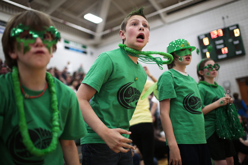 First Place, Photographer of the Year - Small Market - Joshua A. Bickel / ThisWeek Community NewsRiley Passias, center, a fifth-grader at Olde Sawmill Elementary, watches as his schools' team falls behind during the 6th annual Dublin City Schools dodgeball tournament Apr. 5, 2013 at Dublin Scioto High School in Dublin, Ohio.