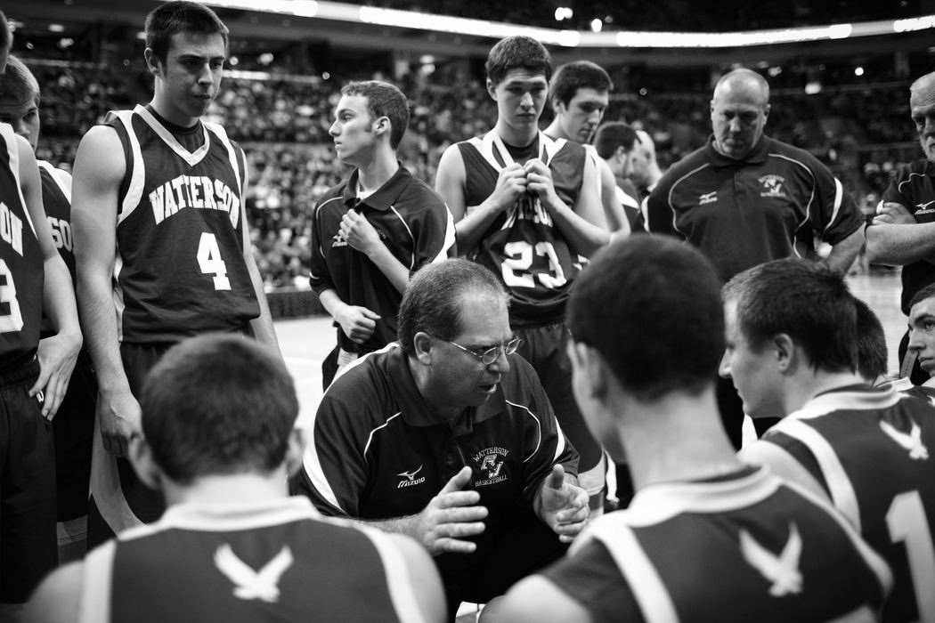 First Place, Photographer of the Year - Small Market - Joshua A. Bickel / ThisWeek Community NewsBishop Watterson head coach Vince Lombardo, center, talks to his team before the start of the fourth quarter during Watterson's state final against Akron St. Vincent-St. Mary Mar. 23, 2013 at Value City Arena in Columbus, Ohio.