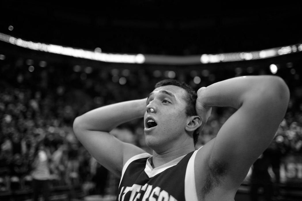 First Place, Photographer of the Year - Small Market - Joshua A. Bickel / ThisWeek Community NewsBishop Watterson's Cody Calhoun reacts as the buzzer sounds on Watterson's 55-52 victory against Akron St. Vincent-St. Mary in their Division II State Championship Final Mar. 23, 2013 at Value City Arena in Columbus, Ohio. It was Watterson's first state title in its 55-year history.