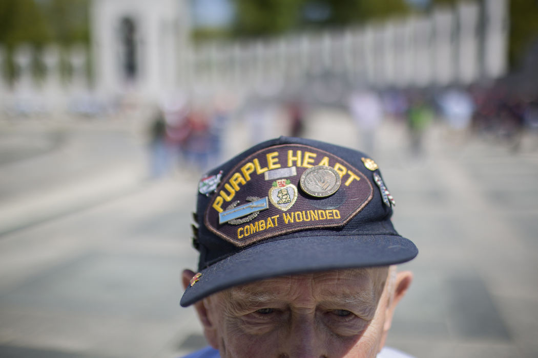 First Place, Photographer of the Year - Small Market - Joshua A. Bickel / ThisWeek Community NewsWorld War II Army veteran Chuck Gaiser, of Radcliffe, Ohio, stands at the World War II Memorial Apr. 27, 2013 in Washington, D.C. Gaiser came with more than 70 veterans and their guardians to see the memorial with Honor Flight Columbus.