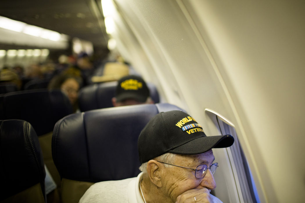 First Place, Photographer of the Year - Small Market - Joshua A. Bickel / ThisWeek Community NewsWorld War II Army veteran James Deeter, of Greenville, Ohio, looks out the window while waiting for the return flight home Apr. 27, 2013 at Baltimore-Washington International Airport.