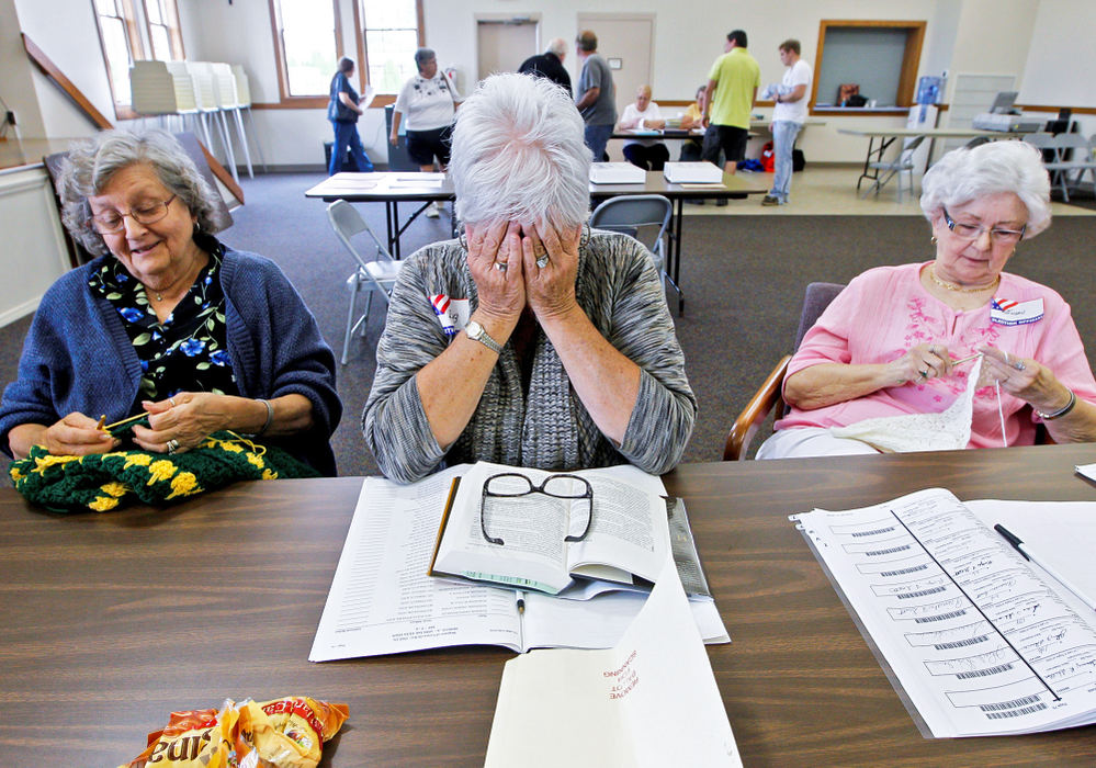 Second Place, Photographer of the Year - Small Market - Barbara J. Perenic / Springfield News-SunWith about three hours left to go until the polls closed, Judie Hopper, Barb Fletcher, and Susan Truchses passed quiet moments with knitting, books, and snacks while working the polls at Risen Christ Lutheran Church on East Possum Road on a special election day.