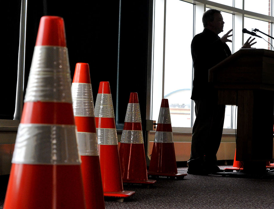 Third Place, Photographer of the year - Small Market - Bill Lackey / Springfield News-SunRandy Chevalley, ODOT District 7 deputy director, talks about the more than 80 construction projects planned for District 7 including the relocation of State Route 794 around the Springfield Air National Guard Base Wednesday, April 10, 2013 during ODOT's construction season kick off event at the guard base. 