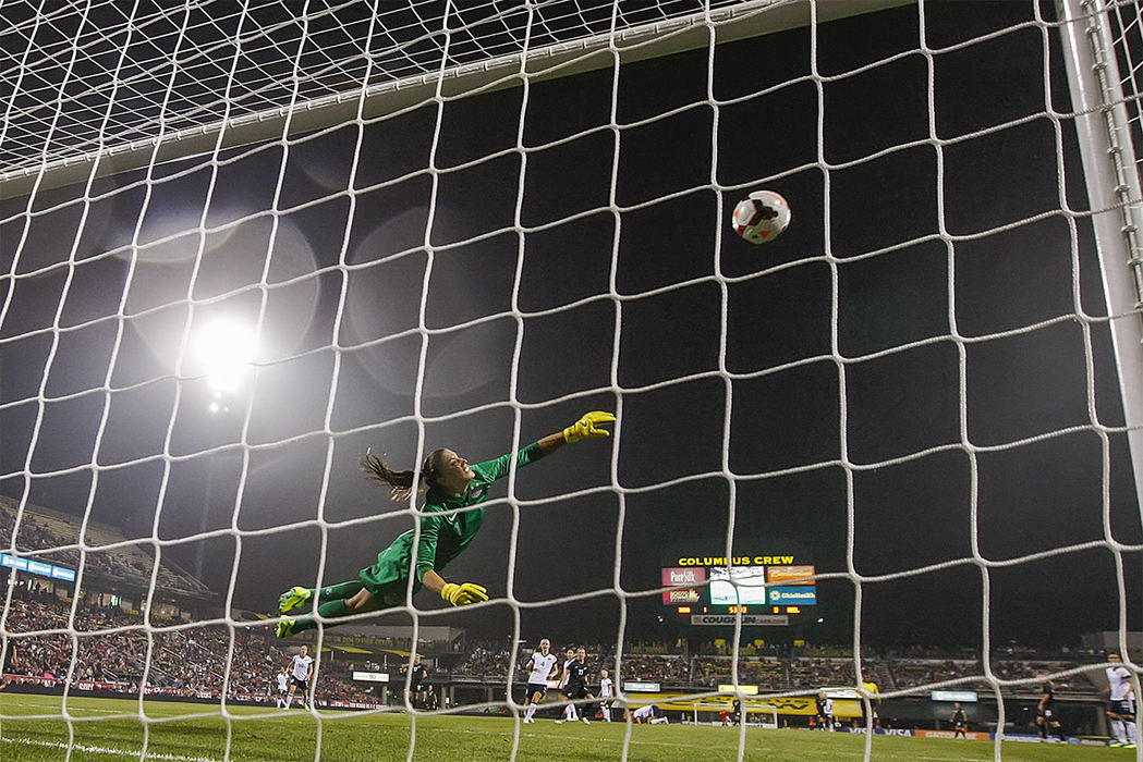Second Place, Sports Action - Alex Holt / The Columbus DispatchHope Solo of the US Women’s National Team makes a diving save in the second half of play against New Zealand ended in a 1-1 draw.