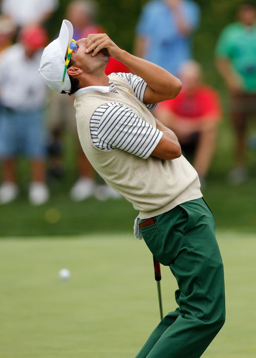 Second Place, Ron Kuntz Sports Photographer of the Year - Adam Cairns / The Columbus DispatchAdam Scott of the International Team reacts to barely missing a putt on the 5th hole during the first round of the Presidents Cup at Muirfield Village Golf Club on Oct. 3, 2013. 