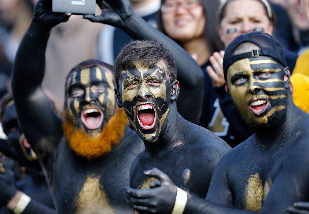 Second Place, Ron Kuntz Sports Photographer of the Year - Adam Cairns / The Columbus DispatchPurdue students cheer on the Boilermakers during the first half of the NCAA football game against Ohio State at Ross-Ade Stadium in West Lafayette, Ind. on Nov. 2, 2013. 