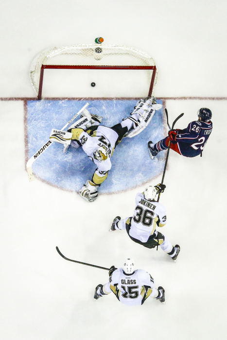 Third Place, Ron Kuntz Sports Photographer of the Year - Jabin Botsford / Western Kentucky UniversityColumbus Blue Jackets right wing Corey Tropp (26) scores during a NHL hockey game between the Columbus Blue Jackets and the Pittsburgh Penguins at Nationwide Arena in Columbus, Ohio on Sunday, Dec. 29, 2013. The Pittsburgh Penguins won 5 to 3.