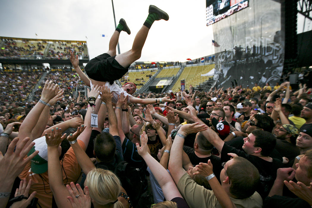 Second Place, Student Photographer of the Year - Alex Holt / University of KentuckyA fan gets somersaulted while crowd surfing during the Cheap Trick set at Rock on the Range Friday evening, May 17, 2013. 