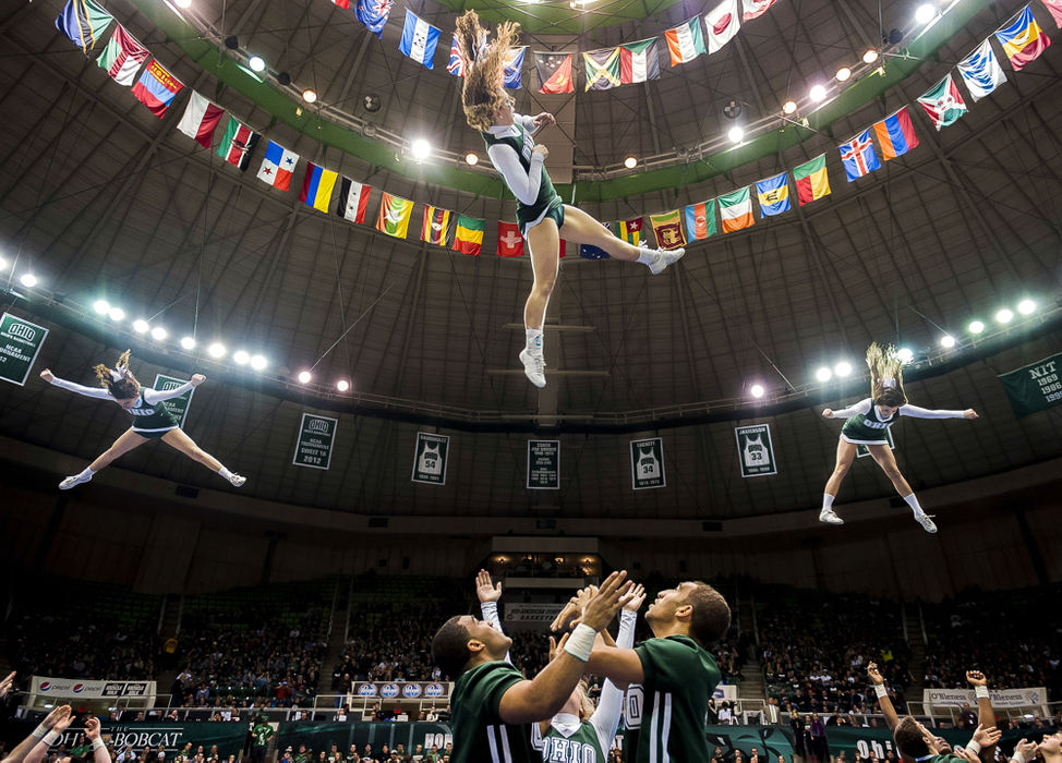 Third Place, Student Photographer of the Year - Logan Riely / Ohio UniversityThe Ohio University cheerleading team performs for over 11,000 Bobcat fans during halftime of the men's basketball game against Akron at the Convocation Center, on Feb. 28, 2013, in Athens, Ohio.