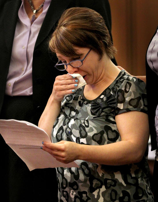 Second Place, Team Picture Story - Marvin Fong / The Plain DealerKidnap victim Michelle Knight makes a statement during the sentencing of her captor Ariel Castro on Aug. 1.  Knight told Castro that she would not let her 10 years in captivity define who she was. 