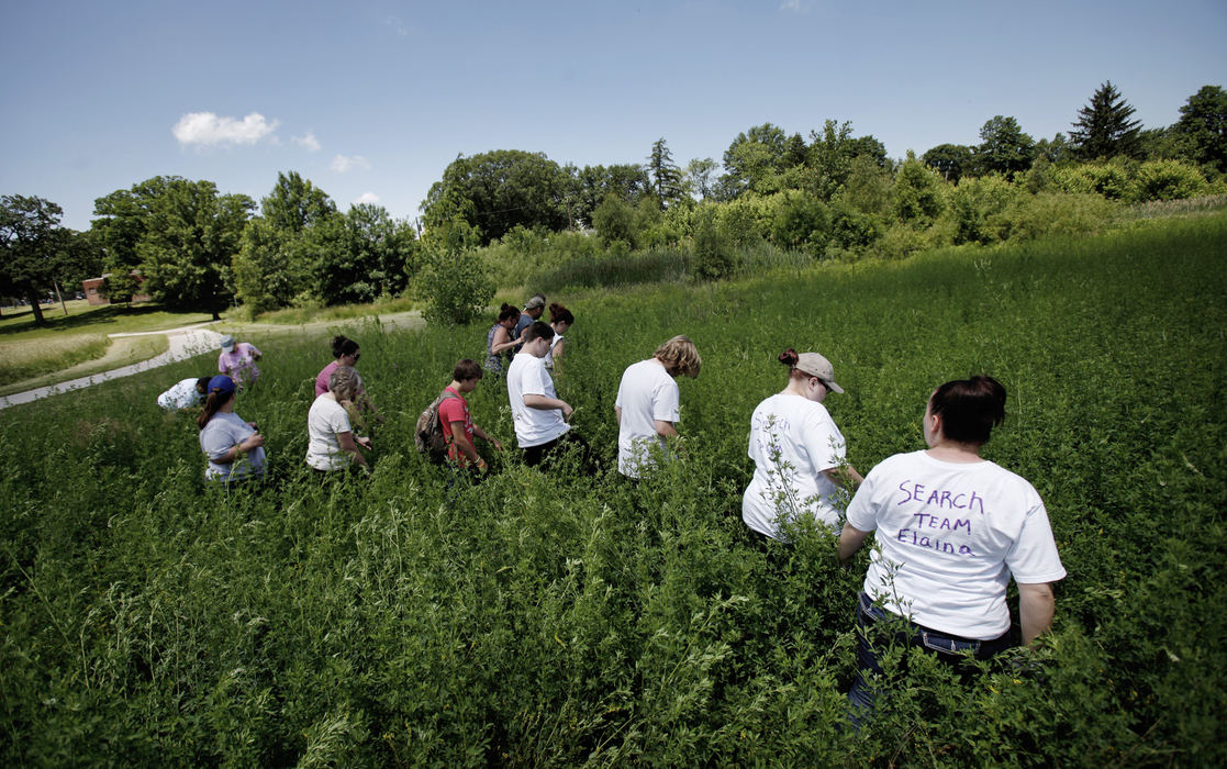 First Place, Team Picture Story - Jeffrey Smith / The (Toledo) BladeVolunteers search in Navarre Park for missing 18-month-old Elaina Steinfurth, June 19, 2013.