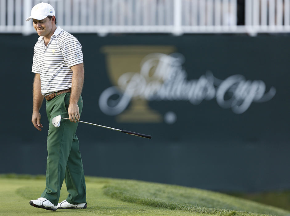 Award of Excellence, Ron Kuntz Sports Photographer of the Year - Chris Russell / The Columbus DispatchRichard Sterne of the International Team grimaces after missing his putt on 12 during the first round of the Presidents Cup.