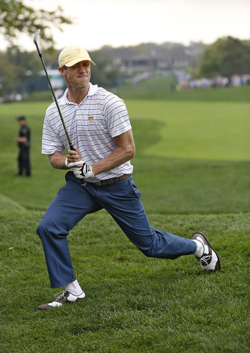 Award of Excellence, Ron Kuntz Sports Photographer of the Year - Chris Russell / The Columbus DispatchGraham Delaet of the International Team reacts to a missed putt on 10 during the third round of the Presidents Cup.