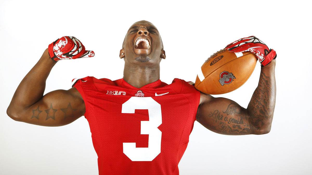 Award of Excellence, Ron Kuntz Sports Photographer of the Year - Chris Russell / The Columbus Dispatch Hoping for another unbeaten season, Ohio State' cornerback Corey "Pittsburgh"  Brown shows his enthusiasm 2013's season.  This photo is one of a series of portraits of Buckeye senior football players. 