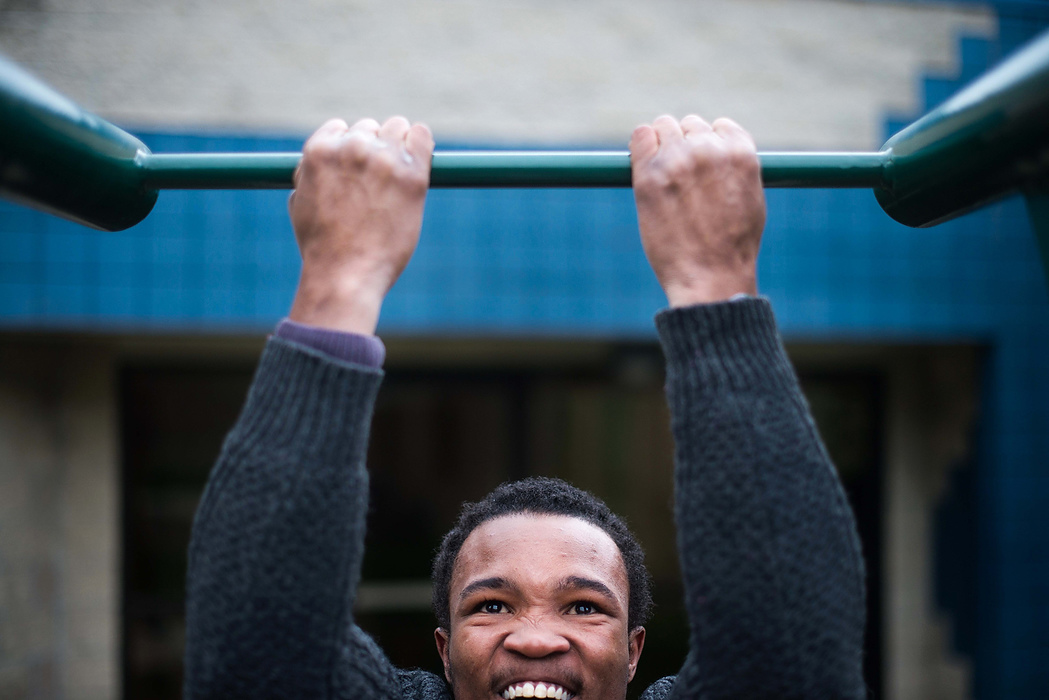 Second Place, Feature Picture Story  - Isaac Hale / Ohio UniversityLarenzo Fisher does pull-ups on the recreational yard's only piece of workout equipment. A former Ohio University football player, Fisher pleaded guilty to felony drug trafficing and is serving his sentence at SEPTA.