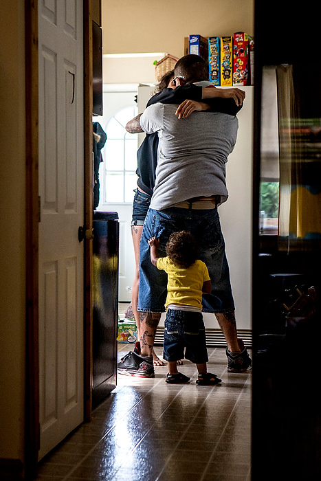 First Place, Feature Picture Story - Jessica Phelps / Newark AdvocateMichele hugs her boyfriend Travis before leaving for her daily trip to be drug tested. Michele and Travis met each other two days after her release from jail. Her son, Syncere, quickly became attached to Travis calling him daddy after a couple of weeks.