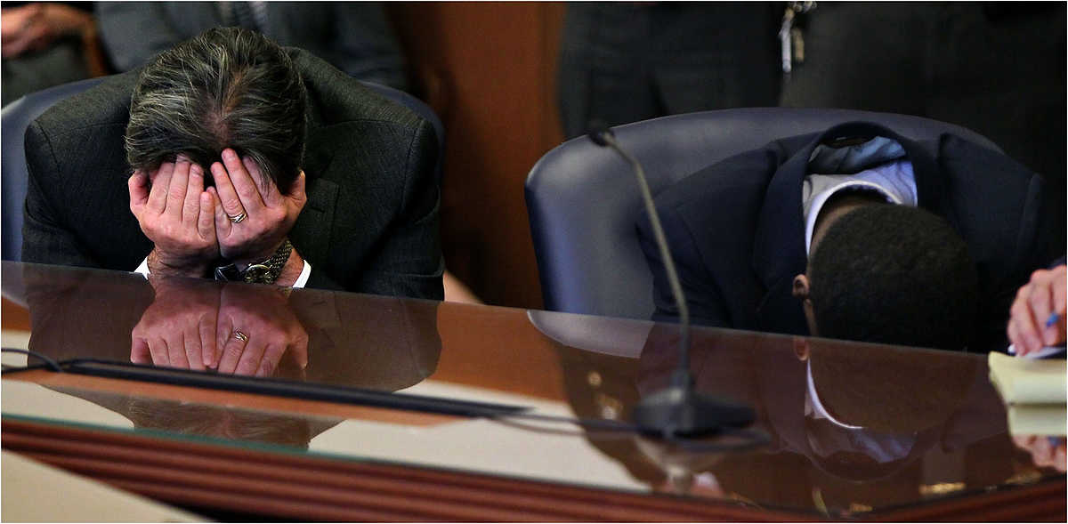 Second Place, General News - ED SUBA JR. / Akron Beacon JournalDefense attorney Jon Sinn (left) and defendant Shawn Eric Ford Jr. react after hearing the jury recommend the death sentence in Ford Jr.'s capital murder trial in the courtroom of Summit County Common Pleas Judge Tom Parker.