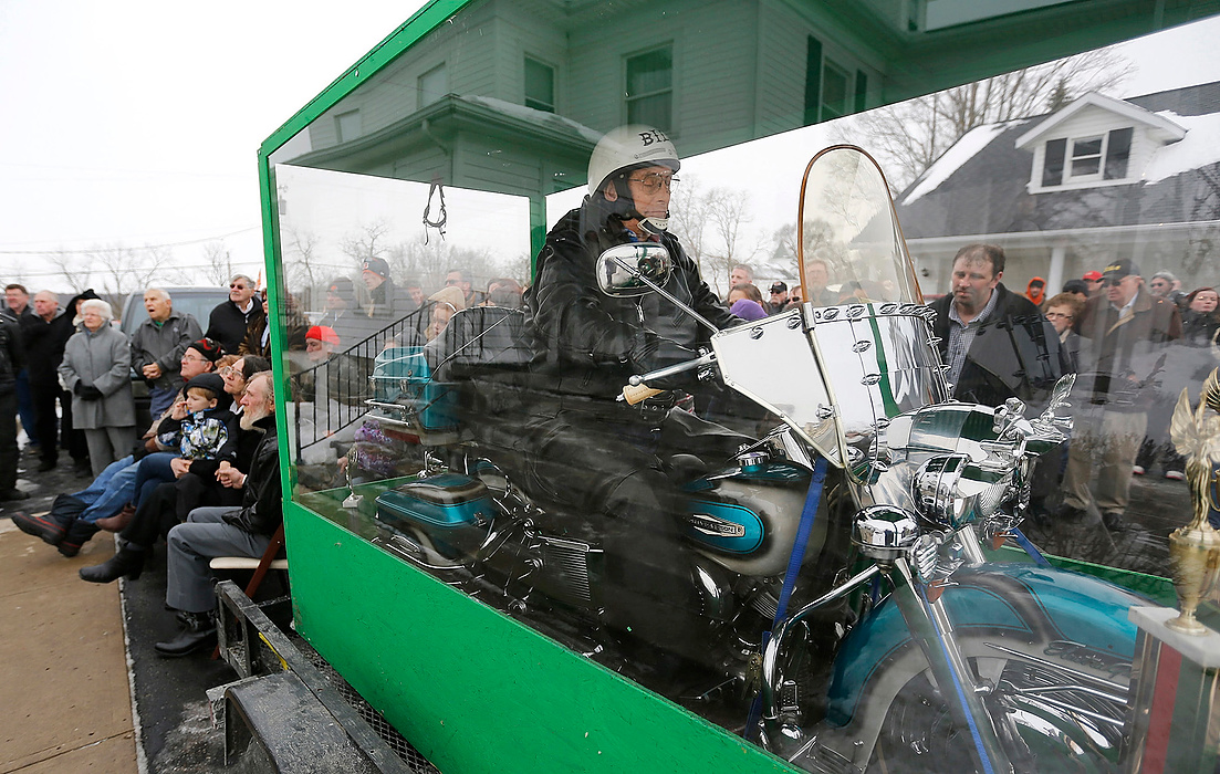 Second Place, News Picture Story - Jonathan Quilter / The Columbus DispatchHere, the body of Bill Standley secured to his 1967 Harley Davidson rests inside a plexiglass box during his funeral service in Mechanicsburg.