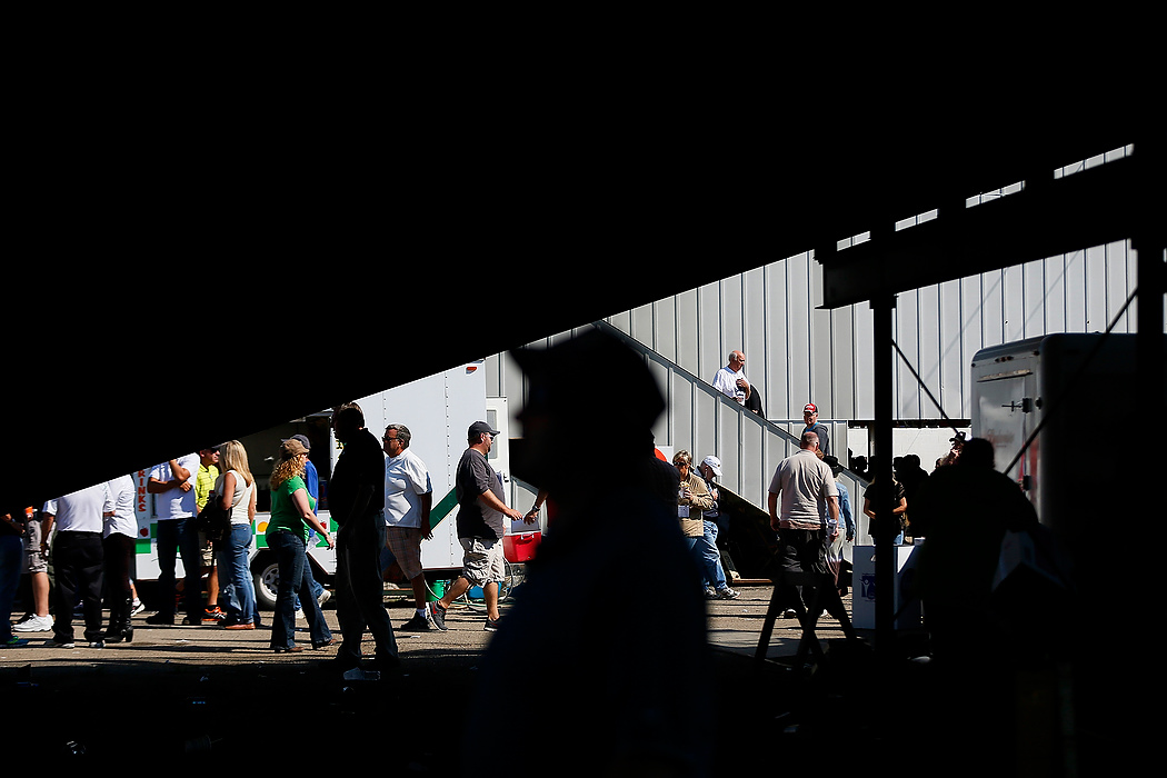 First Place, Photographer of the Year - Large Market - Eamon Queeney / The Columbus DispatchHarness racing fans come and go between races during the 69th running of the Little Brown Jug at the Delaware County Fairgrounds.