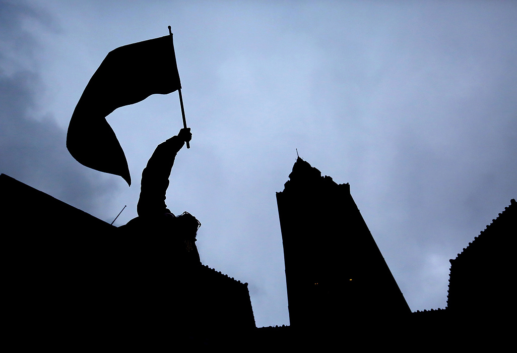 Second Place, Photographer of the Year - Large Market - Lisa DeJong / The Plain DealerDemonstrators gather to protest the killing of 12-year-old Tamir Rice at Public Square. Protesters from Ferguson, Mo. also attended the protest. Rice was fatally shot on Nov. 22 by rookie Cleveland police officer Timothy Loehmann seconds after he arrived to investigate a complaint about Rice carrying what turned out to be a fake gun. 