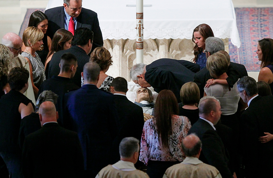 Third Place, Photographer of the Year - Large Market - Andy Morrison / The (Toledo) BladeFamily members say goodbye to Auxiliary Bishop Robert Donnelly during funeral services for him at Our Lady, Queen of the Most Holy Rosary Cathedral.