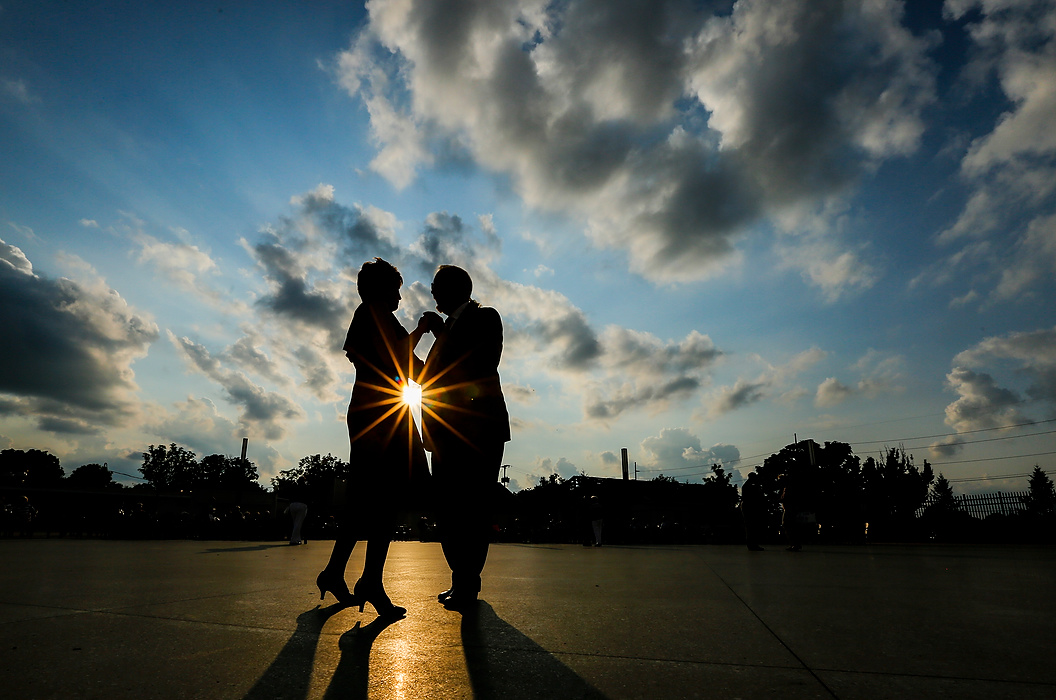 Third Place, Photographer of the Year - Large Market - Andy Morrison / The (Toledo) BladeSandy Feicht and Duane Mills, both of Sandusky, enjoy a dance against the setting sun as Centennial Terrace celebrates its 75th anniversary with the Johnny Knorr Orchestra.