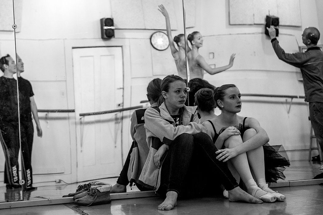 First Place, Photographer of the Year - Small Market - Jessica Phelps / Newark AdvocateA few weeks into rehearsal, Madison Weisend made the difficult decision to pull out of the performance due to a sciatic nerve injury. While watching her friend Ava Hamstead practice as the understudy to her role, Madison began to cry, wishing she was the one dancing. Taryn Benson rushed to her side to comfort her. 