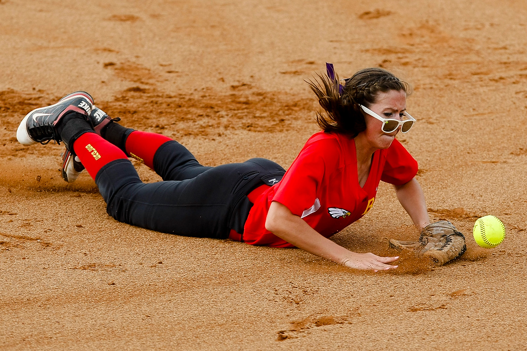 Second Place, Photographer of the Year - Small Market - Joshua A. Bickel / ThisWeek Community NewsBig Walnut's Leah Shaw misses a line drive during the Eagles' OHSAA Division I regional softball semifinal against Gahanna Lincoln at Buckeye Field in Columbus. Big Walnut lost to Gahanna, 3-0.