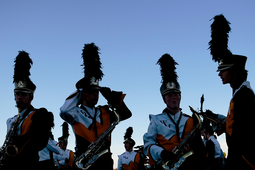 Second Place, Photographer of the Year - Small Market - Joshua A. Bickel / ThisWeek Community NewsMembers of the Watkins Memorial Marching Band prepare for their pregame performance before the Warriors' football  game against Newark Catholic at Watkins Memorial High School in Pataskala.