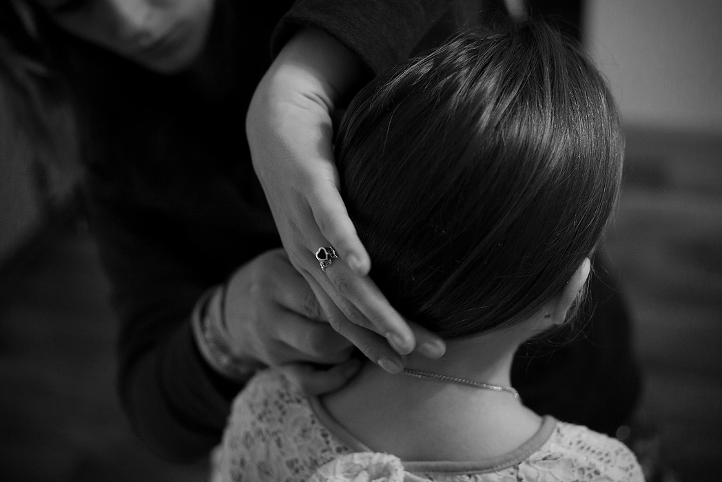 Second Place, Photographer of the Year - Small Market - Joshua A. Bickel / ThisWeek Community NewsBrittany fixes Kalysta's hair while getting ready for the first day of school in Reynoldsburg.