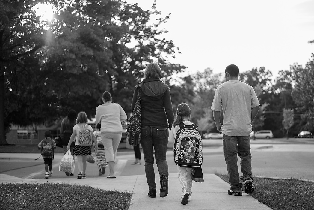 Second Place, Photographer of the Year - Small Market - Joshua A. Bickel / ThisWeek Community NewsBrittany walks Kalysta to school with Andrew (right) in Reynoldsburg. Brittany is still undergoing outpatient rehabilitation and counseling, and marked six months of sobriety in September. "No matter what I did to other people and myself, to my daughter and family, the only thing I can do it move forward," she said. "I can't change any of the things I did."