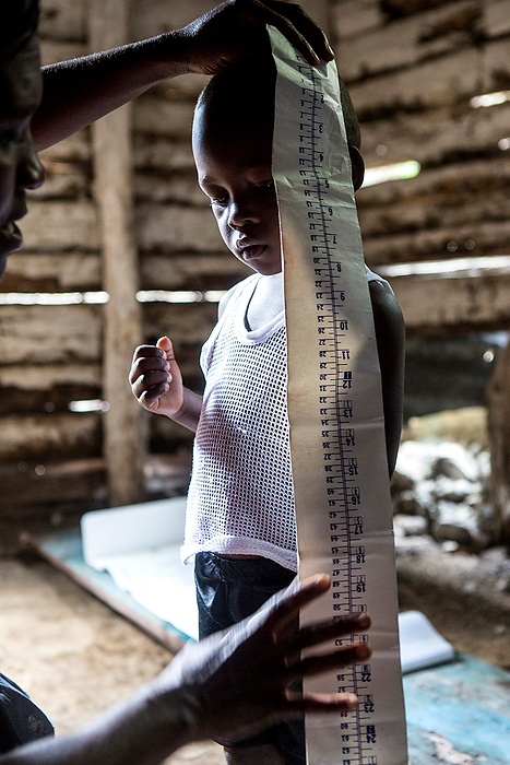 First Place, Photographer of the Year - Small Market - Jessica Phelps / Newark AdvocateA boy gets measured during a basic check-up at a makeshift clinic in the mountainside town of Demier Haiti.