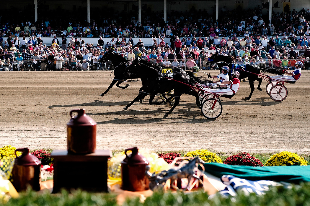 Second Place, Photographer of the Year - Small Market - Joshua A. Bickel / ThisWeek Community NewsDrivers race toward the finish line during an elimination race of the Little Brown Jug at the Delaware County Fairgrounds in Delaware.