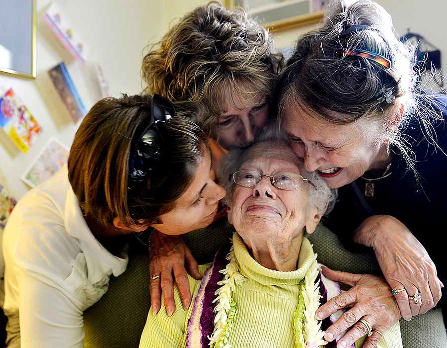 Third Place, Photographer of the Year - Small Market - Bill Lackey / Springfield News-SunAlice Matthews smiles as she's surrounded by her family, from left, her niece Morna Fitzgerald, daughter, Maureen Espo, and daughter Judith Fitzgerald, at Belle Manor in New Carlisle. The 100th anniversary of Mothers Day, Alice will also be 100 years old and her family will be traveling from all over the country to visit her for a party at Belle Manor.
