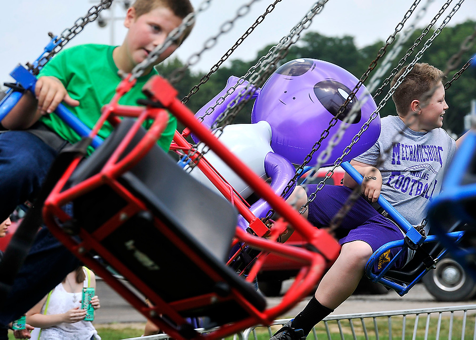 Third Place, Photographer of the Year - Small Market - Bill Lackey / Springfield News-SunAn inflatable midway prize takes up a seat on a ride at the fair. 