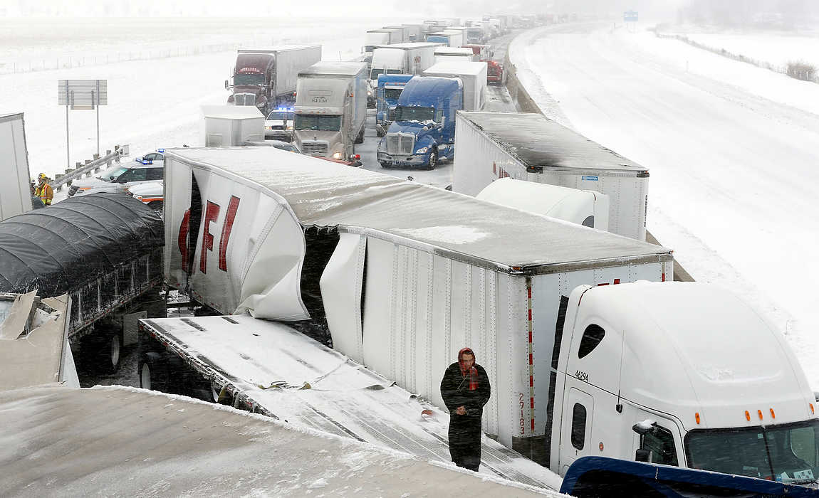 First Place, Spot News - Large Market - Jeremy Wadsworth / The (Toledo) Blade Multi-vehicle fatal accident in the eastbound lane of the Ohio Turnpike near the County Road 268 overpass in Clyde. 