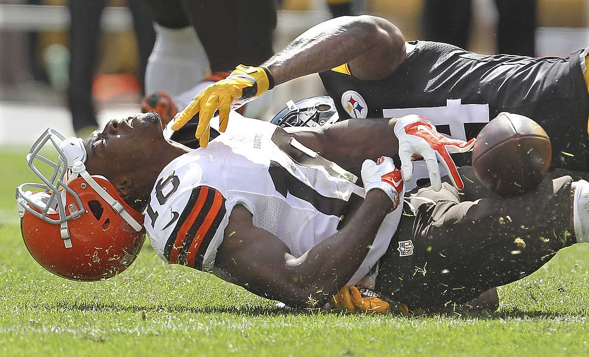 Second Place, Sports Action - Phil Masturzo / Akron Beacon JournalCleveland Browns receiver Taylor Gabriel is separated from the ball by Pittsburgh Steelers Ike Taylor on a second quarter play at Heinz Field in Pittsburgh. 