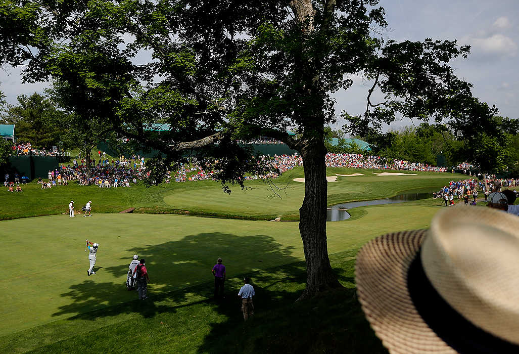 First Place, Ron Kuntz Sports Photographer of the Year - Eamon Queeney / The Columbus DispatchHideki Matsuyama hits from the fairway of the 14th hole in to the rough off the green during the final round of the Memorial Tournament at Muirfield Village Golf Club in Dublin. Matsuyama went on to win a sudden death playoff match with Kevin Na to seal his win of the Memorial Tournament.