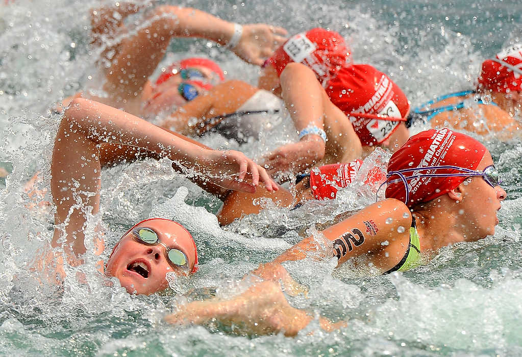 Second Place, Ron Kuntz Sports Photographer of the Year - Erik Schelkun / Elsestar ImagesCompetitors battle for their line just after the start of the USA Triathlon Junior Elite National Championships at Voice of America park in West Chester.