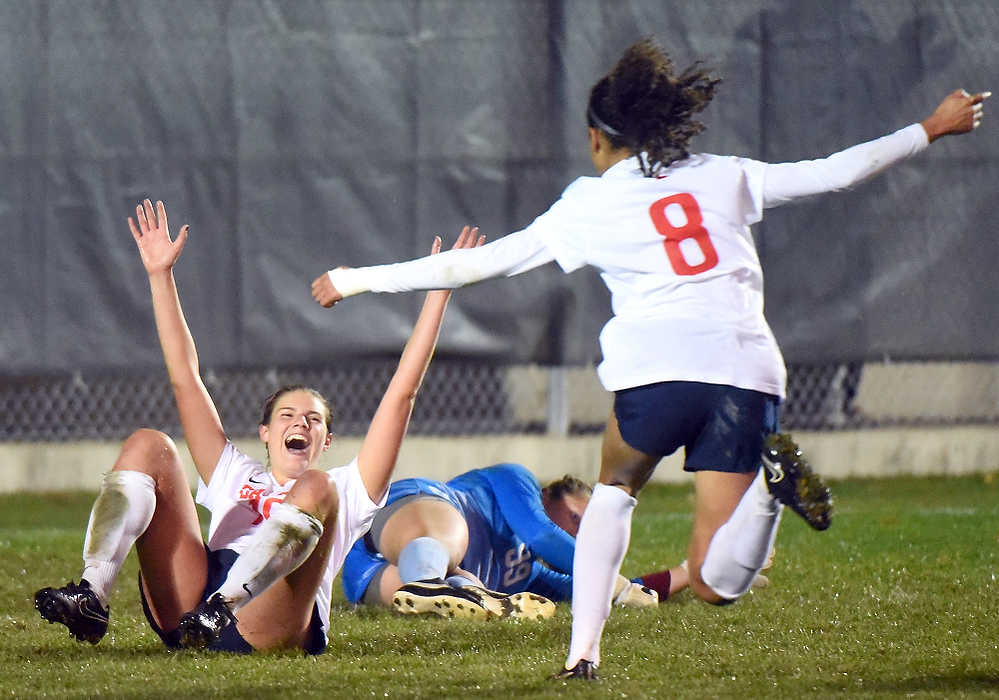 Second Place, Ron Kuntz Sports Photographer of the Year - Erik Schelkun / Elsestar ImagesDayton's Ashley Campbell (08) rushes in to celebrate with Erin O'Malley after she scored a golden goal for a 2-1 overtime win against St. Joseph in the first round of the Atlantic 10 conference tournament at Baujan Field in Dayton. 