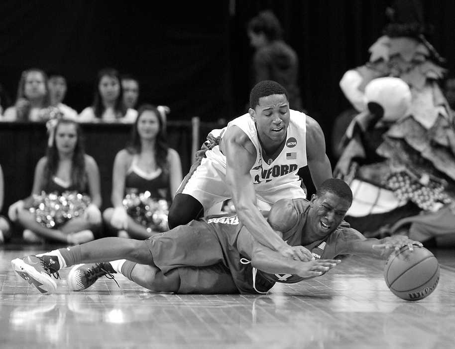 Second Place, Ron Kuntz Sports Photographer of the Year - Erik Schelkun / Elsestar ImagesDayton's Jordan Sibert pulls in a loose ball under Anthony Brown of Stanford during the NCAA Sweet 16 matchup in Memphis. The Flyers defeated Stanford 82-72 to advance to the Elite 8. 